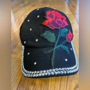 Embellished Black Cap with Red Rose Design embroidered and silver studs.
